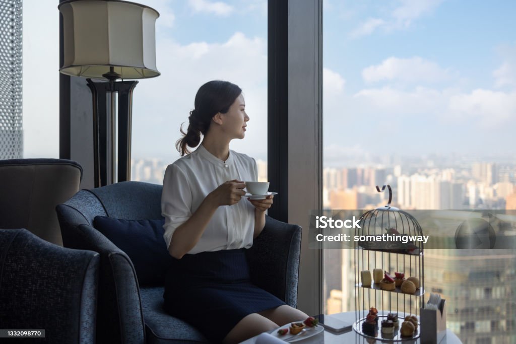 Business women in coffee shops Afternoon Tea Stock Photo