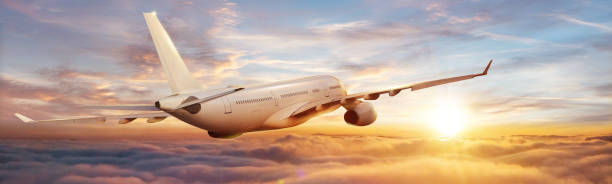 istock Passengers commercial airplane flying above clouds 1332099404