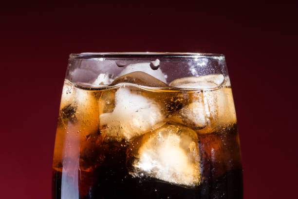 istock Cola with ice cubes in a close-up glass 1332100766