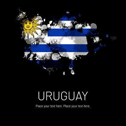 Flag of Uruguay ink splat on black background. Splatter grunge effect. Copy space. Solid background. Text sample.