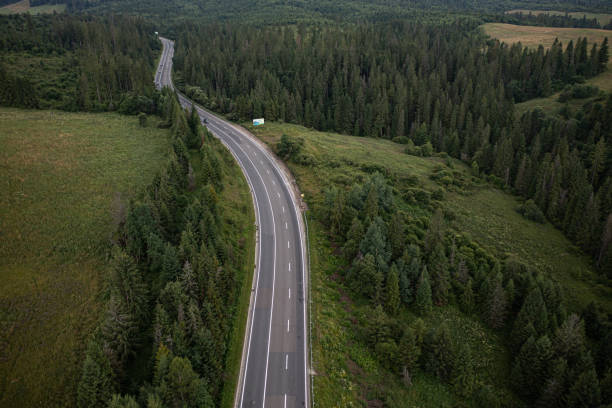 istock Aerial view on mountain road 1332104829