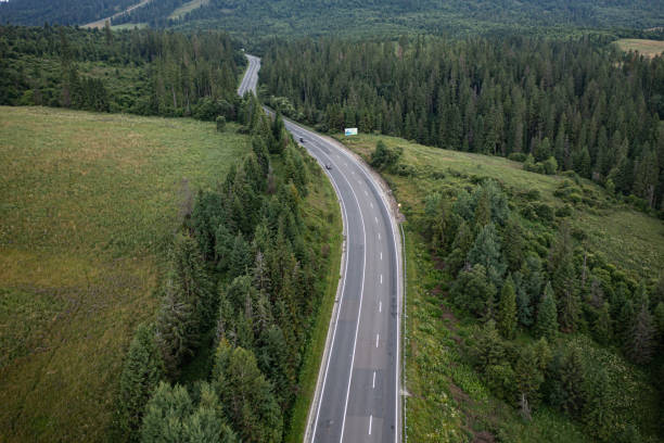 istock Aerial view on mountain road 1332105816