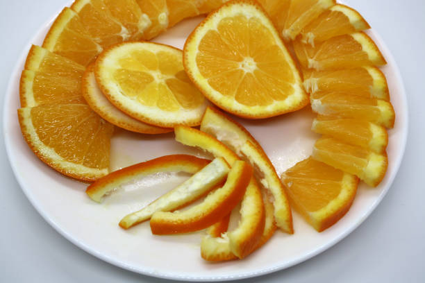 istock Juicy orange slices on a white background. Vitamin C. 1332105976