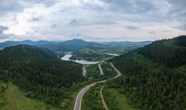 istock Aerial view on mountain road 1332105998
