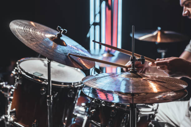 istock Close up the drummer plays drums with drum sticks. 1332107652