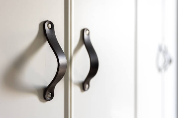 istock Black handles of the kitchen drawer or cabinet. 1332109769
