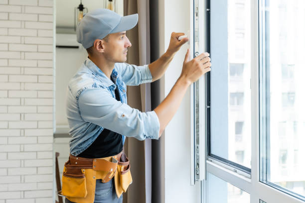 istock Young handyman male worker repair window 1332110073