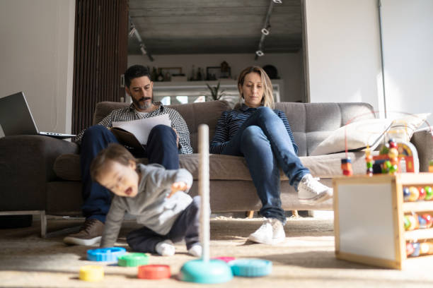 istock Baby boy playing at home - boy with special needs 1332111731