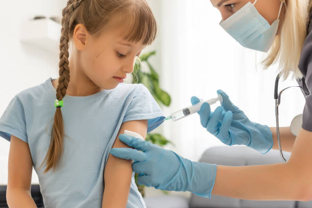istock The doctor makes a child vaccination 1332112217