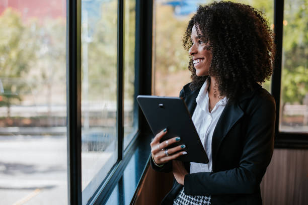 istock Young businesswoman using digital tablet 1332113638