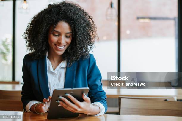Young Businesswoman Using Digital Tablet Stock Photo - Download Image Now - Women, One Woman Only, People