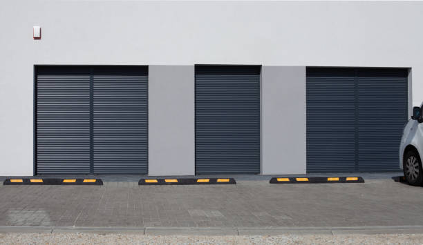 istock Empty parking lot with yellow car stops. 1332118389