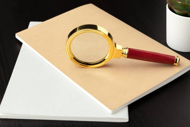 istock Modern workplace on wooden table with a lot of things on it. Top view 1332119002