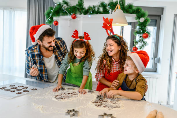istock Family having fun while making Christmas cookies. 1332119318
