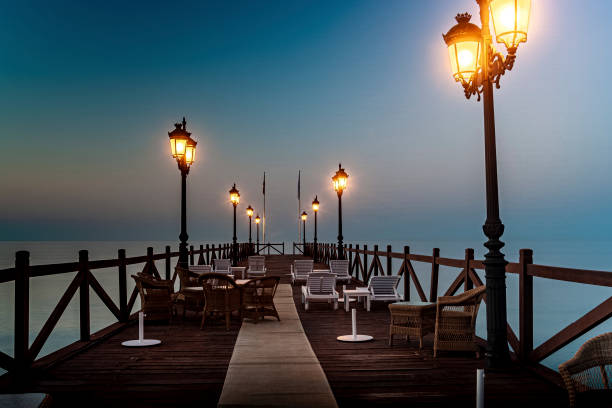 The elegant pier of Puente Romano has been for some time one of the most characteristic symbols of Marbella. Its street lamps lit from sunset to sunrise create a romantic atmosphere right on the edge of the Mediterranean Sea.