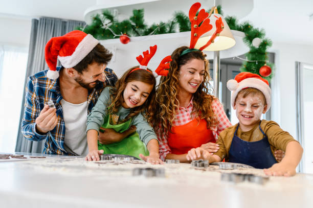 istock Family having fun while making Christmas cookies. 1332120714