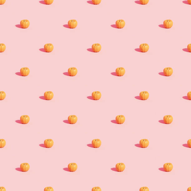 istock Pumpkins pattern on pink background for advertising on autumn holidays or sales, 3d render 1332124369
