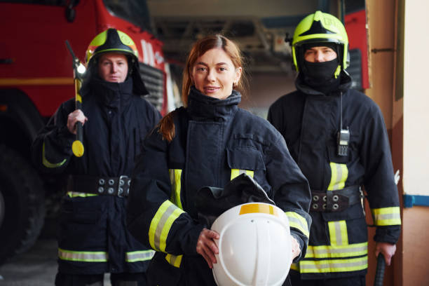 istock Group of firefighters in protective uniform that is on station 1332124534