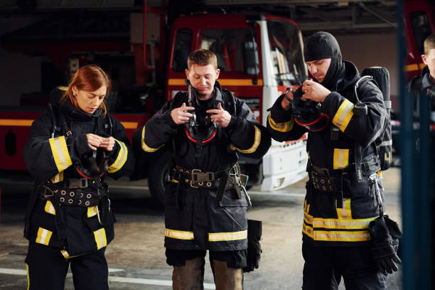istock Wearing protective uniform. Group of firefighters that is on station 1332127042