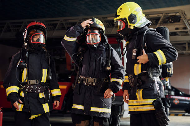 istock Wearing protective uniform. Group of firefighters that is on station 1332127077