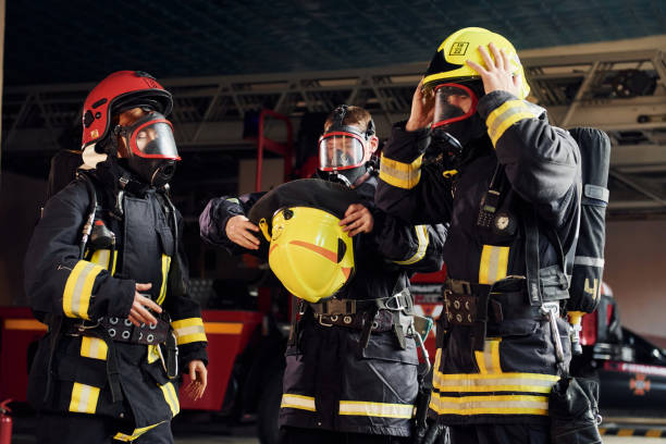 istock Wearing protective uniform. Group of firefighters that is on station 1332127333
