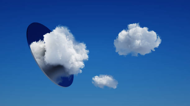 istock 3d render, abstract panoramic background with white clouds and round metallic mirror in the blue sky 1332129082