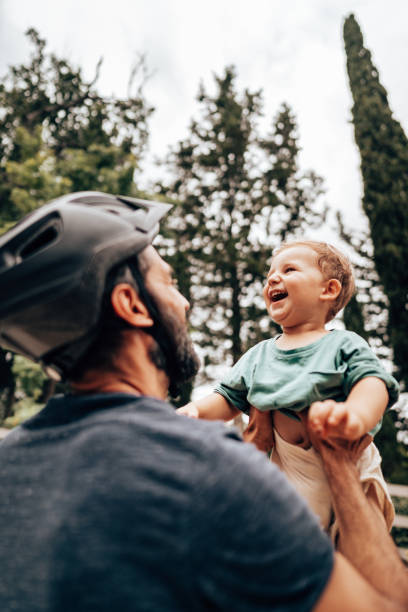 istock man carrying the son on the sky 1332130885