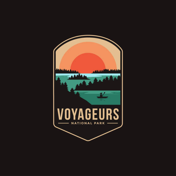 Emblem patch vector illustration of Voyageurs National Park on dark background Emblem patch vector illustration of Voyageurs National Park on dark background retro landscape stock illustrations