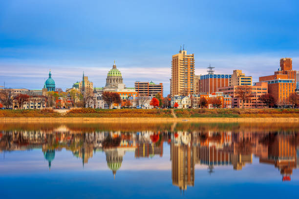 Harrisburg, Pennsylvania, USA skyline on the Susquehanna River. Harrisburg, Pennsylvania, USA skyline on the Susquehanna River at dusk. harrisburg pennsylvania photos stock pictures, royalty-free photos & images