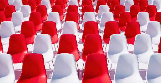 istock Group of empty red and white colored chairs 1332138914