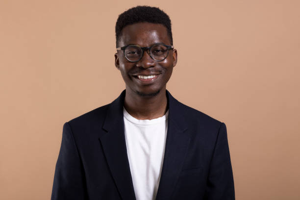 istock Young African American man posing in a photo studio 1332139054