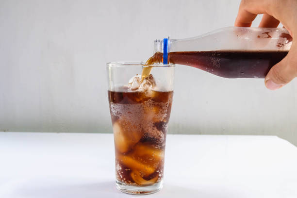 istock Glass of soft drinks and black soft drinks on the table 1332140153
