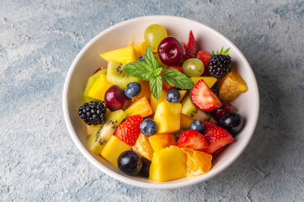 istock Fruit salad with fresh summer fruits 1332140740