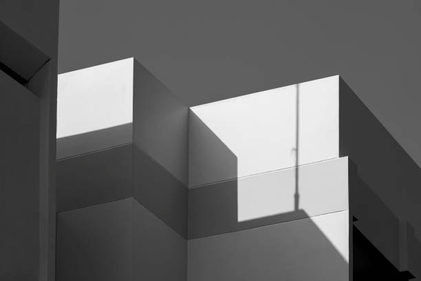 istock Sunlight and shadow on surface of office buildings in black and white style 1332142065