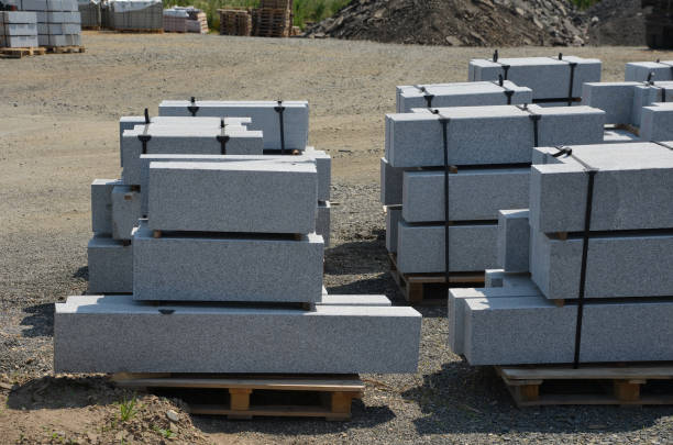 istock granite curbs of cut granite. smooth stoneware products stacked on a pallet ready for transport to the construction site. curbs vary in length 1332144652