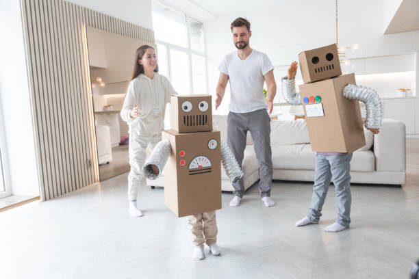 istock Family playing robots at home 1332145228