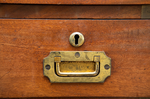 Close-up of an old wooden cabinet