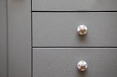 Chest of drawers with decorative handles