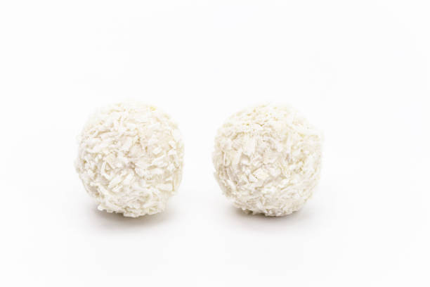 istock coconut candy on isolated white background, coconut candy in ball. 1332149337