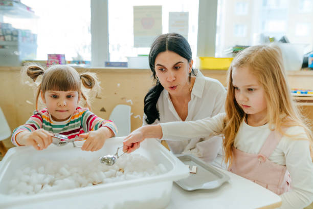istock Learning play activities in kindergarten or daycare centre 1332150544