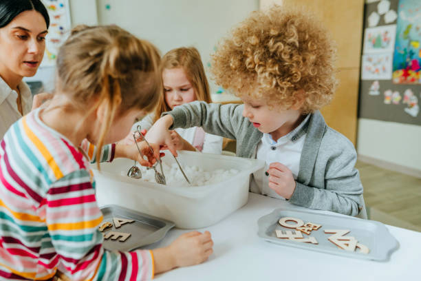 istock Learning play activities in kindergarten or daycare centre 1332150558