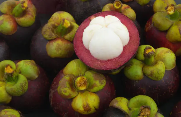 Ripe mangosteen fruits as background