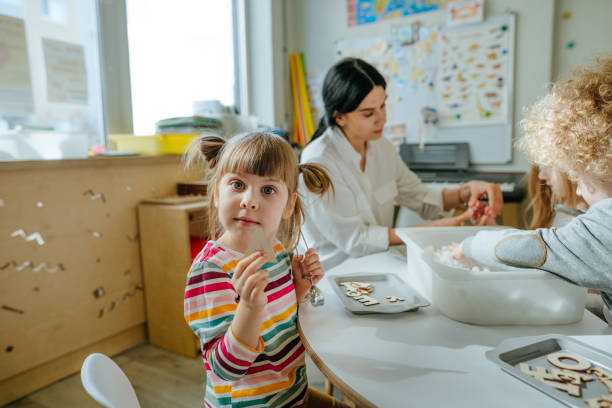 istock Learning play activities in kindergarten or daycare centre 1332150660