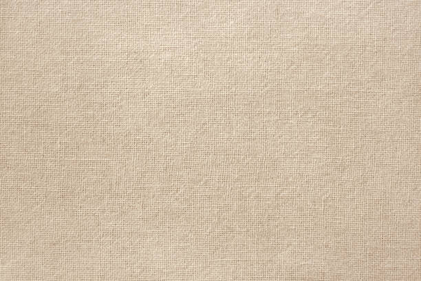 Brown cotton fabric texture background, seamless pattern of natural textile.