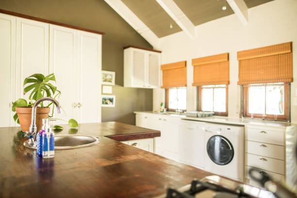 istock Interior of a spacious kitchen in a home with vaulted ceilings 1332158290