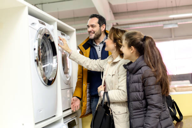 istock Family buying a washing machine 1332158816