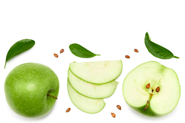 istock green apples with green leaf and slices isolated on a white background. clipping path. top view 1332162937