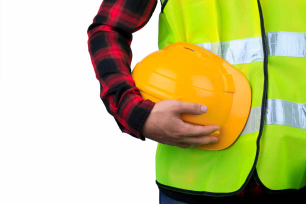 istock Close up engineering man standing with white safety helmet Isolated on white background 1332165190