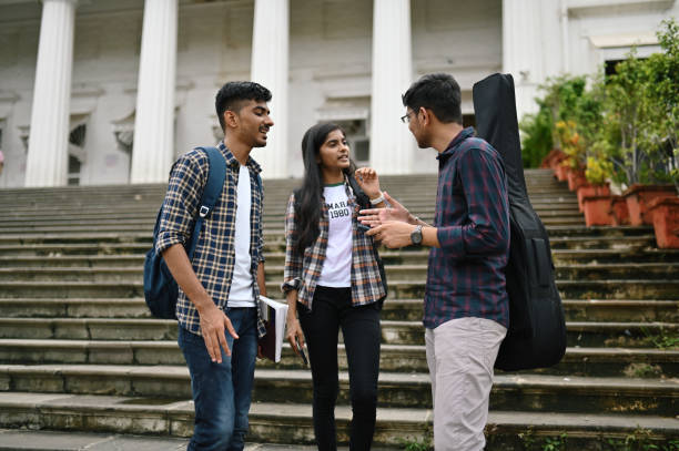 istock Students standing and talking in the University campus 1332167757