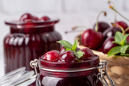 Fresh organic cherries - cherries and cherries in jars - sour cherry jam
